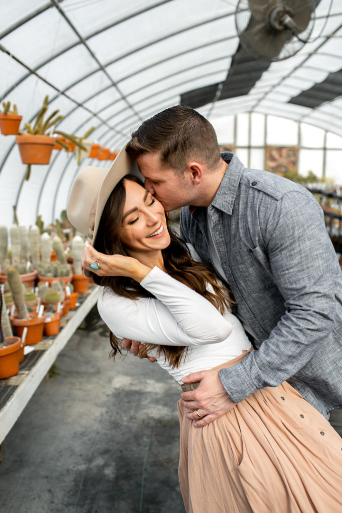 Iowa greenhouse couple kissing
