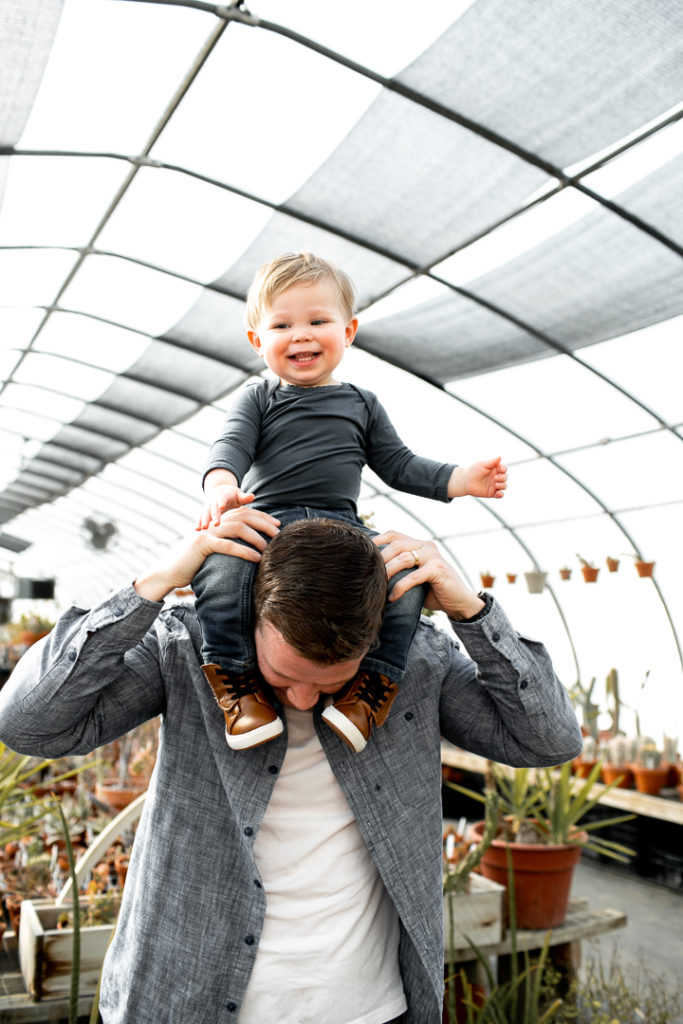 Father and son in Des Moines greenhouse