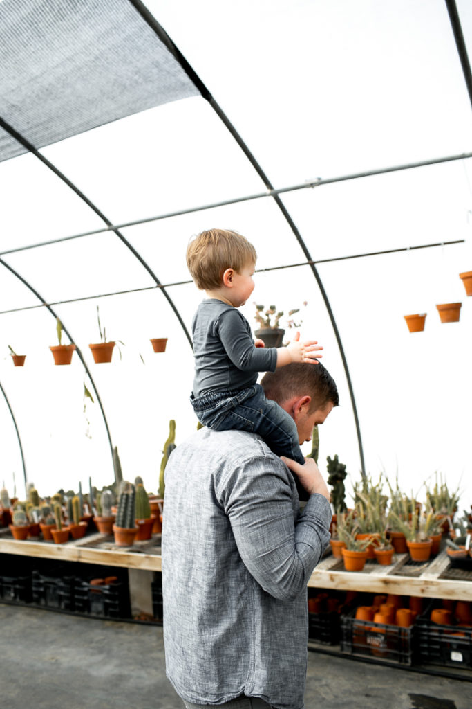 Father and son in Des Moines greenhouse