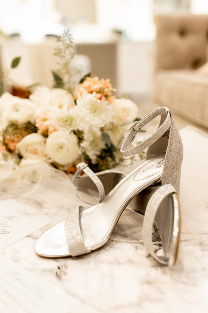 More beautiful up close photos of wedding shoes and bridal bouquet. 
